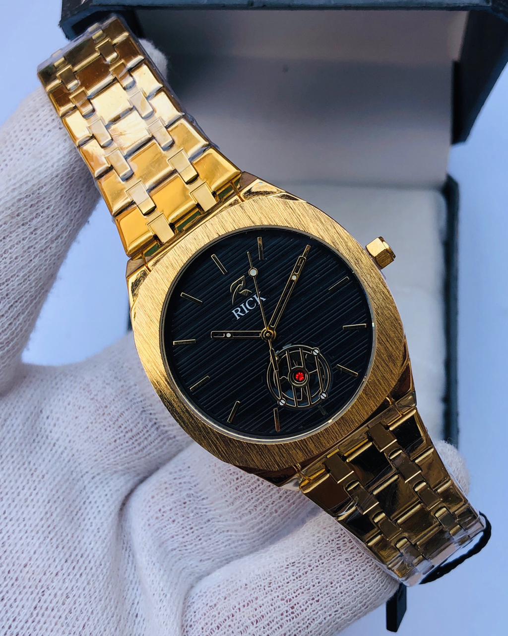 RICK Luxury Gold Stainless Steel Watch – Black Dial | Article No: RK-26 | 1 Year Warranty